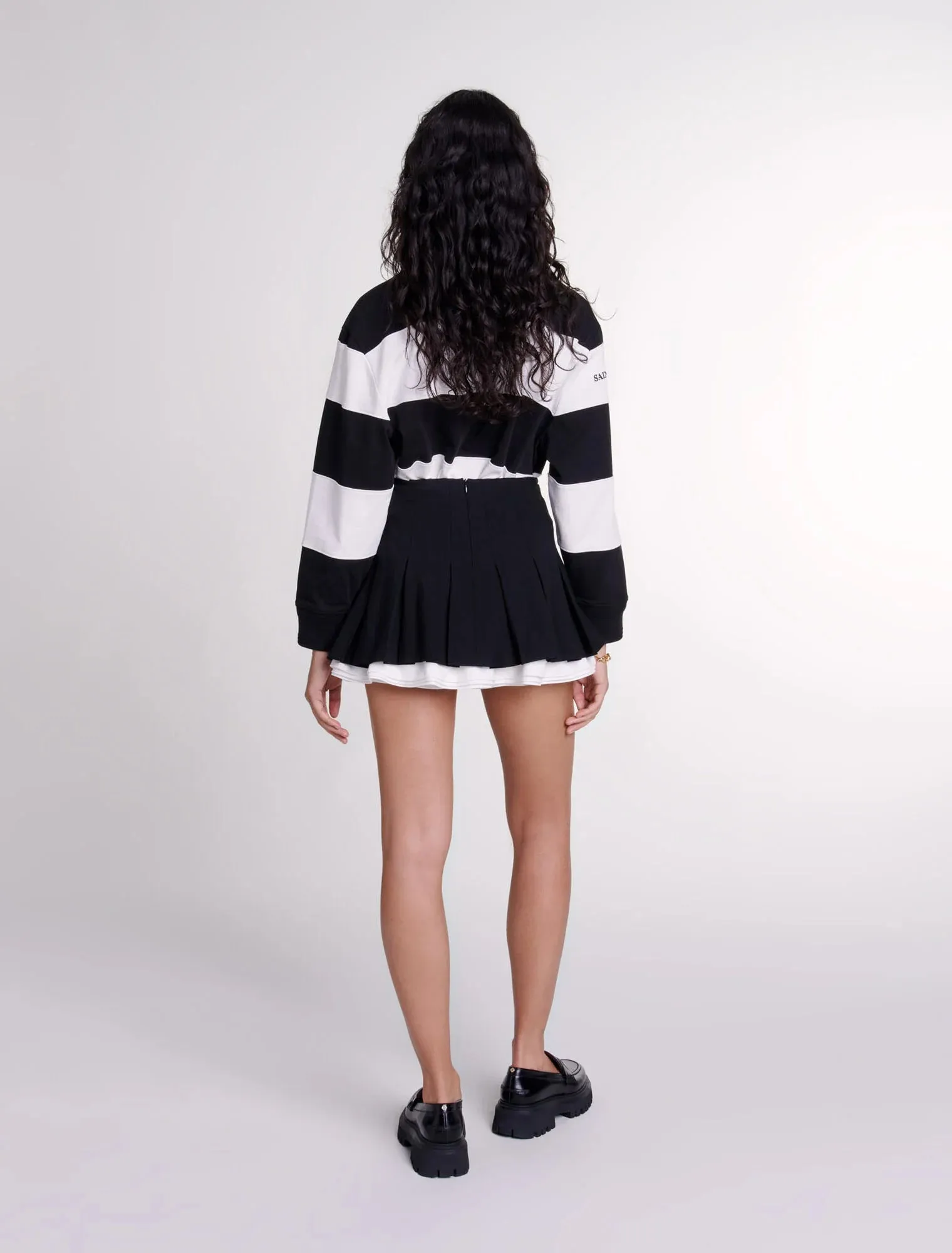 Dual-material pleated skort