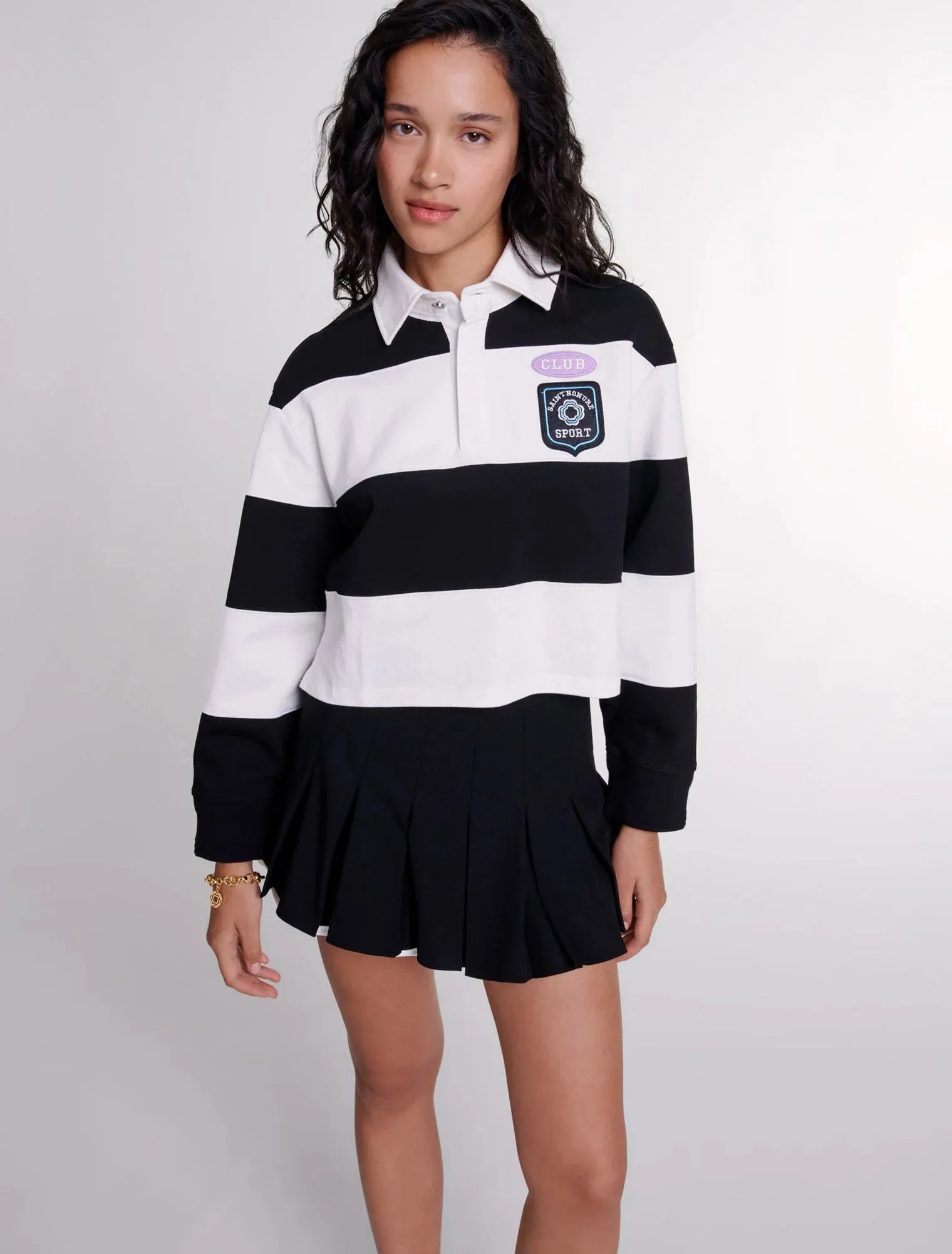 Dual-material pleated skort